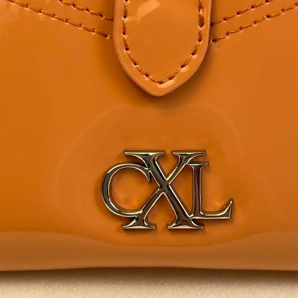 CXL Christian Lacroix Metro Patent Bi-Fold Skinny Wallet Tango NWT $48